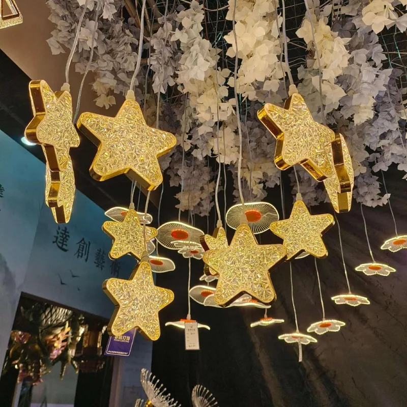Thick chandelier with five pointed star gold, 10 lights